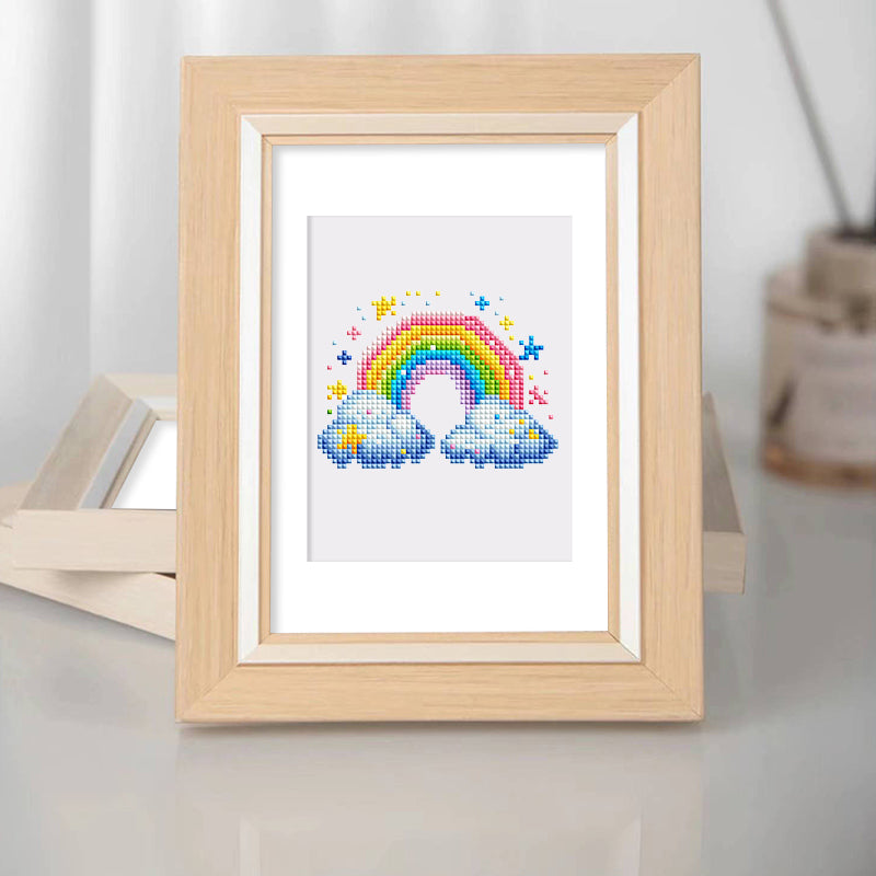 Finished rainbow-themed mini diamond painting framed for home decor. Sparkling resin drills and detailed canvas ideal for beginners and gift ideas.