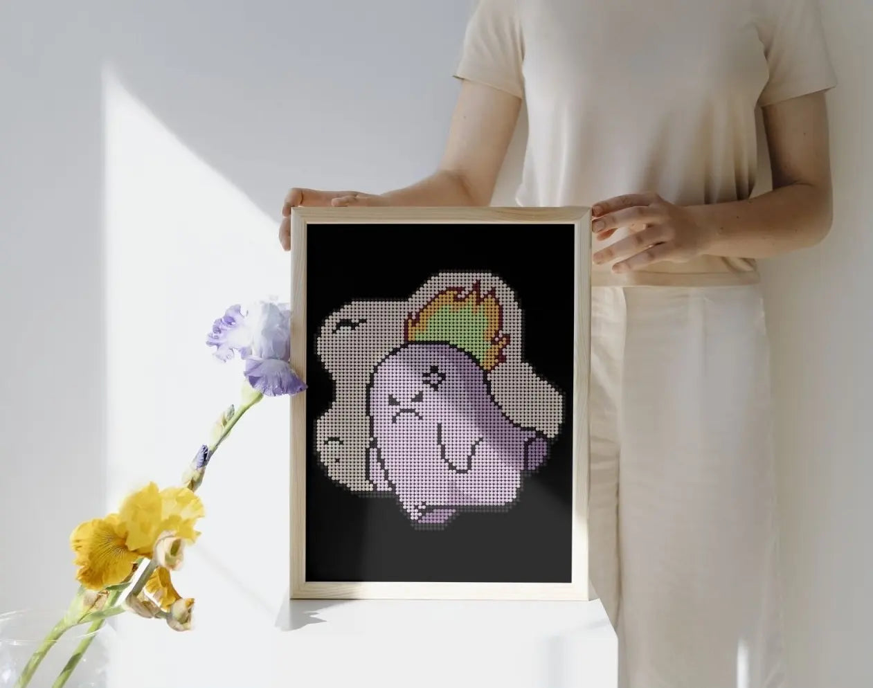Framed mini cute Angry Ghost diamond painting, displayed as wall art. Purple tone with flame detail, 20x30cm, 3,585 round drills, 9 colors and 1 AB or Fairy Dust drill. Creative and expressive dƩcor or gift.