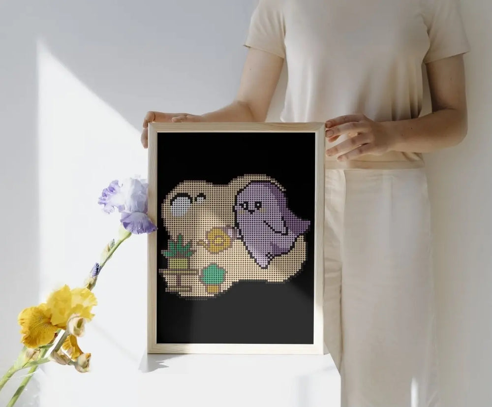 Framed mini cute Ghost with Watering Can diamond painting as wall art. Purple pastel tones, 20x30cm with 3,123 round drills, 10 colors plus 1 AB or Fairy Dust drill. Gentle décor or gift for plant lovers.