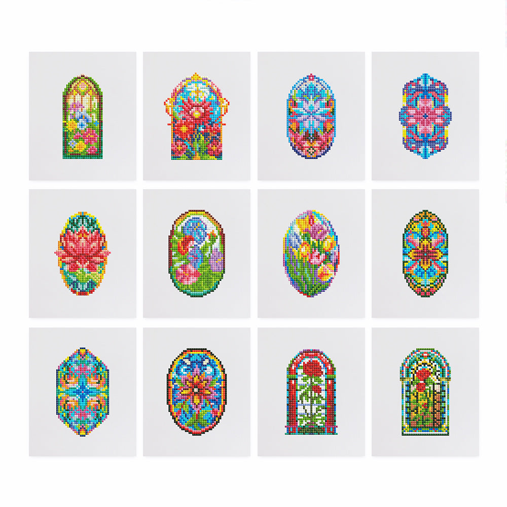 This diamond painting kit features stunning floral designs inspired by stained glass windows. With vibrant flowers and intricate geometric patterns, each design bursts with rich colors and delicate detail. The variety of flowers, including roses, lilies, and other florals, are arranged within beautiful stained glass-like frames, making each piece a bright and eye-catching addition to any room. Ideal for those who love vibrant DIY DIAMOND ART and are looking for an artistic way to showcase nature’s beauty