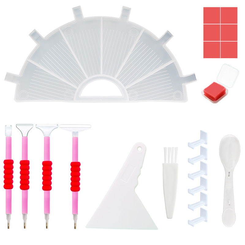 White diamond painting tool kit featuring 6-slot tray, 4 pens, wax blocks, spoon, brush, finger protectors, and tip options. Clean and simple design keeps workspace organized, speeds up multi-color projects, and makes diamond placement accurate, stress-free, and travel-friendly.