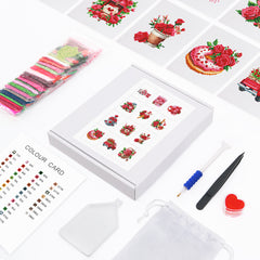 Flat lay of Bloom & Bite diamond painting kit including 12 canvas cards, resin drills, toolkit, and printed box – great for beginners.