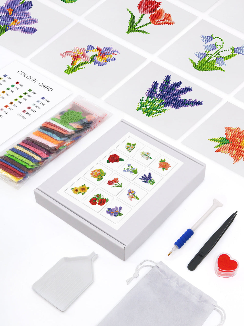 Top-down view of Botanical Blooms diamond painting kit including tools, box, and color guide – ready for creative crafting.
