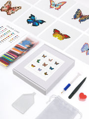 Complete butterfly mini diamond painting kit with colorful drills, pen tool, tweezers, wax, color card, and boxed 9 butterfly canvases – perfect DIY gift for beginners.