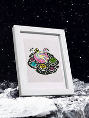 Psychedelic astronaut skull design in a white frame on clean desk – mystical and modern style.
