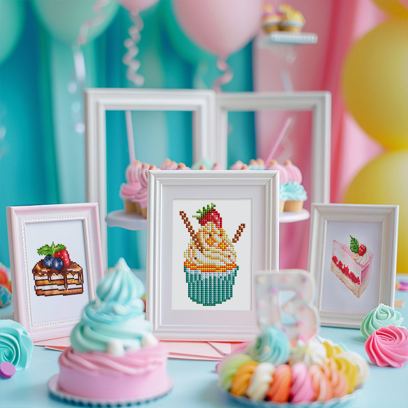 Cupcake diamond paintings showcased with colorful macarons and pastel decor in a playful setting.easy and fun for art  beginners!