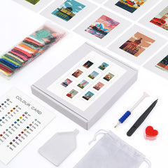 Travel mini kit contents showing tools, color chart, canvas—perfect for crafting on-the-go.