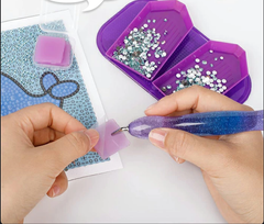 Diamond painting tools in use with glitter pen, wax pad, and trays – ideal for focused DIY artists looking for precision and smooth crafting flow.