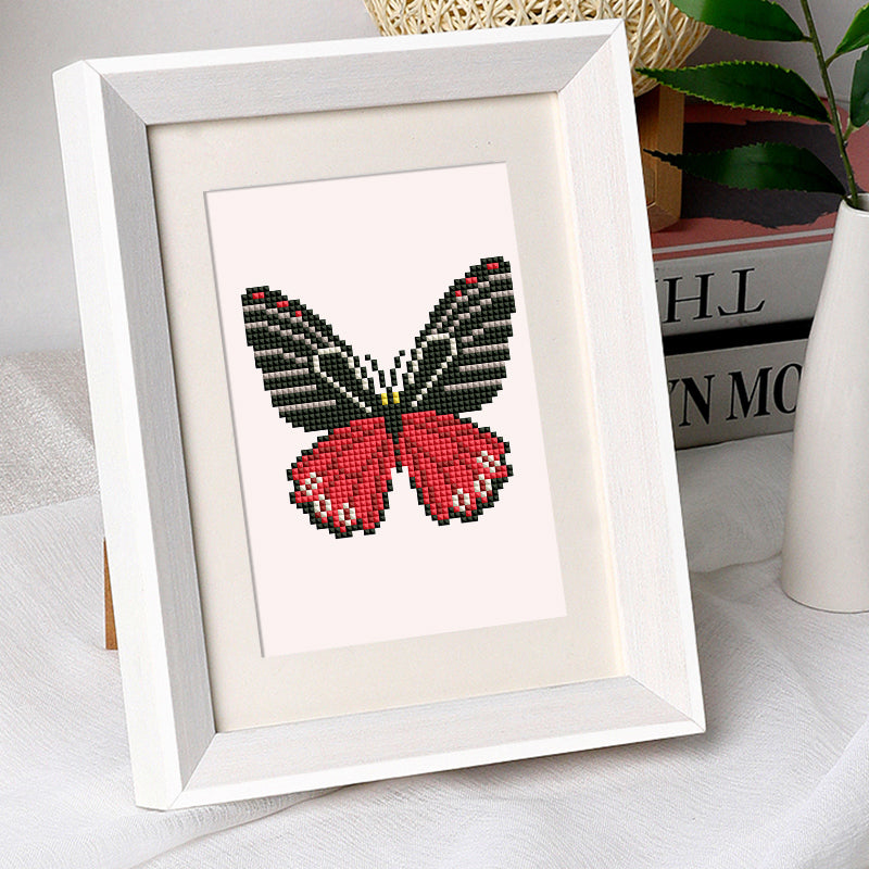 Framed red and black butterfly mini diamond painting