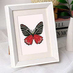 Framed red and black butterfly mini diamond painting