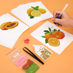 Close-up of hands working on fruity mini diamond painting, such as orange and lemon,ideal for mindfulness, DIY fans, and creative summer activities.