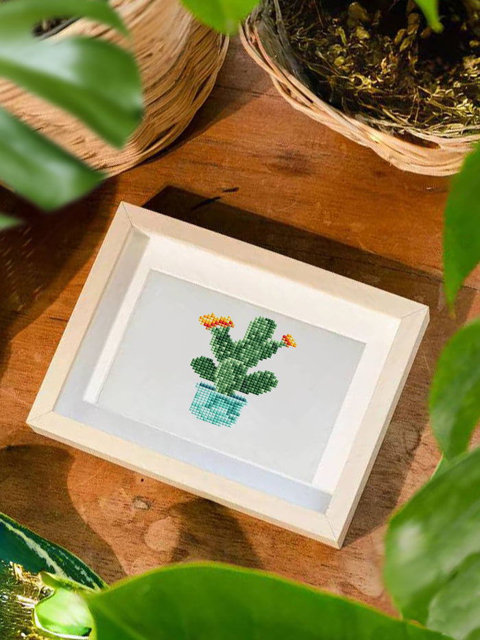 A diamond painting of a modern succulent plant in a minimalist ceramic pot, ideal for gifting to plant parents and craft fans alike.