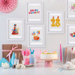 Framed birthday-themed diamond paintings with cake, candles, balloons, and text “Happy Birthday” displayed in a festive party setup—ideal for decorating birthday tables or kids’ craft areas, and perfect for beginners seeking fun and colorful mini kits.