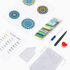 Flatlay of mandala diamond painting kit with canvas, color card, tools, and drills – complete set for relaxing crafts