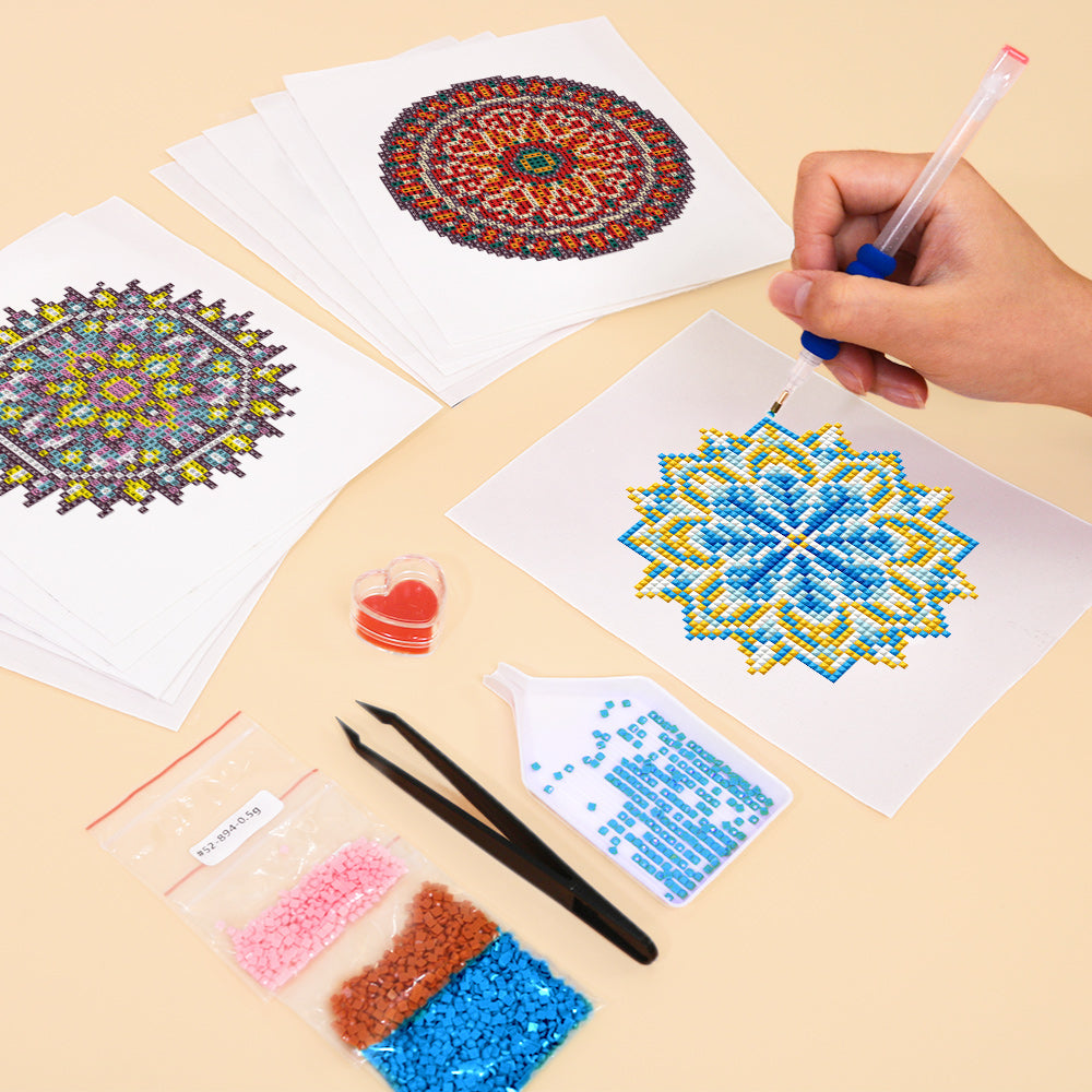 Hands working on a mandala diamond painting canvas, beginner-friendly DIY craft for mindfulness