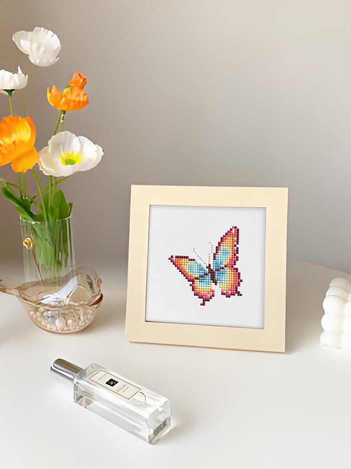Peacock-style butterfly with eye-like wings in diamond art, perfect for animal-themed diamond painting sets.