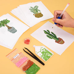 A DIY diamond painting in progress showing leafy houseplants—ideal for indoor plant decor and mindful crafting.