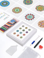 Rainbow Mandala diamond painting kit flat lay showing full set: 9 mandala canvases, drills, pen, tweezers, and color guide.