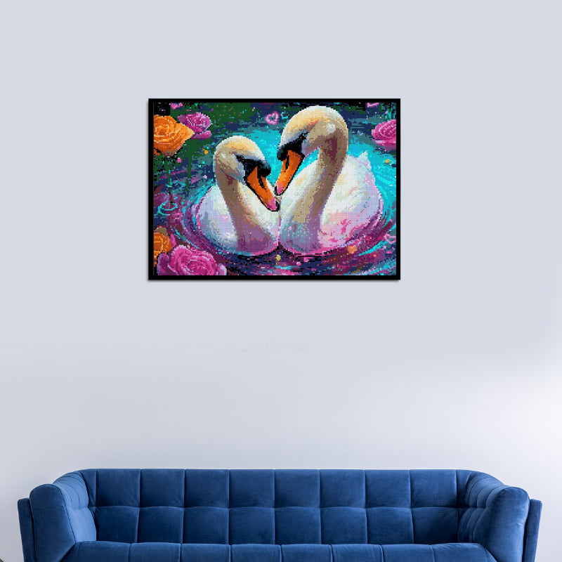 Framed diamond painting of two swans forming a heart shape, displayed in a modern living room above a blue sofa—ideal for romantic wall art.