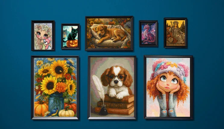 Diamond painting home gallery display, the blue wall is covered with completed diamond paintings of different sizes, all framed with wooden frames