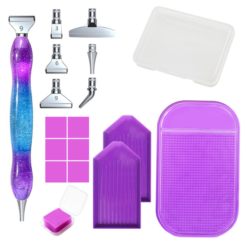 17 piece Diamond painting pen set with ergonomic purple-blue pen, 6 tips, trays & case – ideal for beginners and experienced crafters alike.