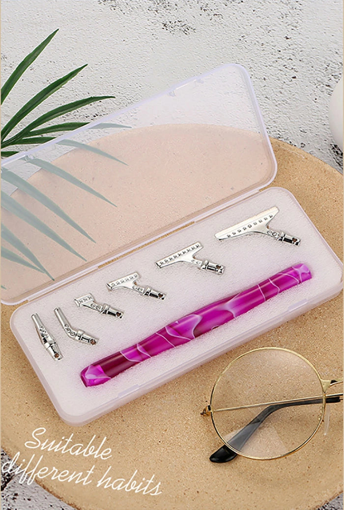 Pink diamond painting pen kit with steel tips and box in lifestyle setting – perfect for DIY creators who enjoy organized and beautiful tools.