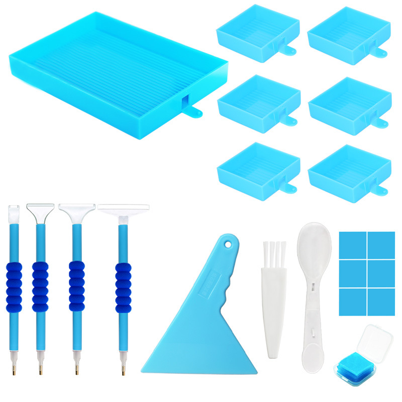 Blue diamond art tool kit with 7 trays, 4 pens, wax, spoon, and brush – perfect for efficient, colorful DIY diamond painting sessions.