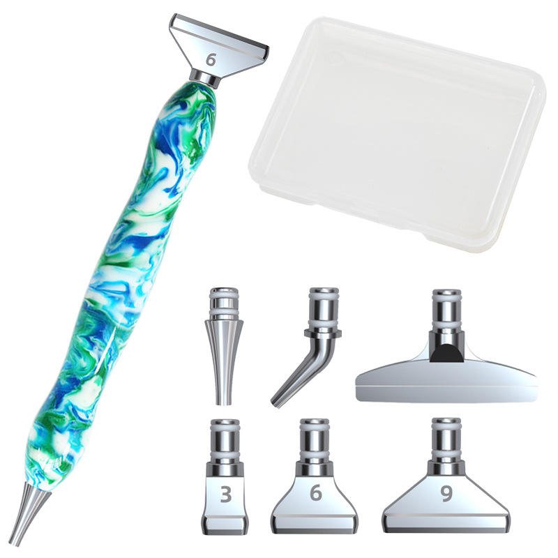 Diamond painting tools with blue marbled pen, angled and multi-tip options – made for comfort, control, and sparkling art.