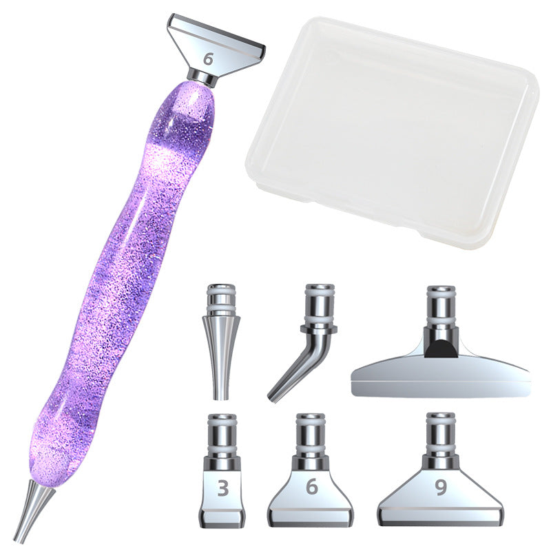 Diamond painting pen set with glittery purple body, tip case and multiple placers – ideal for precision art and DIY enthusiasts.