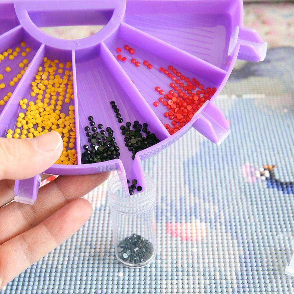 Purple diamond painting tray in use, sorting multiple colors of resin drills for easier crafting and getting fast storage  diamonds