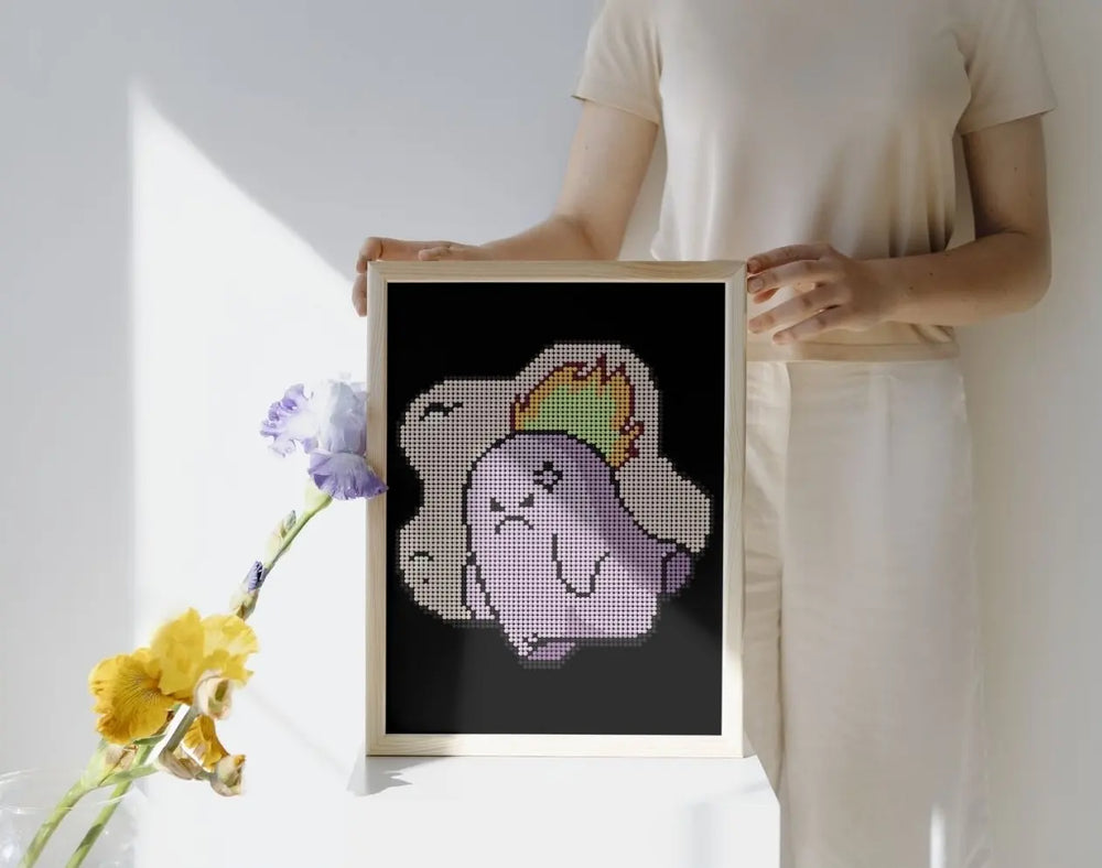 Framed mini cute Angry Ghost diamond painting, displayed as wall art. Purple tone with flame detail, 20x30cm, 3,585 round drills, 9 colors and 1 AB or Fairy Dust drill. Creative and expressive décor or gift.