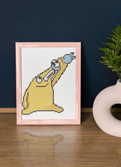 Framed version of the Mischievous Creature, featuring expressive arms and a wide smile. A perfect funny gift or desktop decor for whimsical minds. This small diamond painting brings personality to child’s rooms, creative corners, or art-themed shelves.