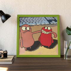 Finished framed Monster Mischief diamond painting displayed in a home setting. This small, funny canvas makes the perfect desktop decor for lovers of quirky characters. Whether in a kid’s room, office, or creative nook, this playful art piece delivers laughter and warmth in a compact, handmade format.