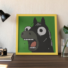 Mounted shocked horse diamond art framed on wall, great for lightening up any workspace or bedroom.