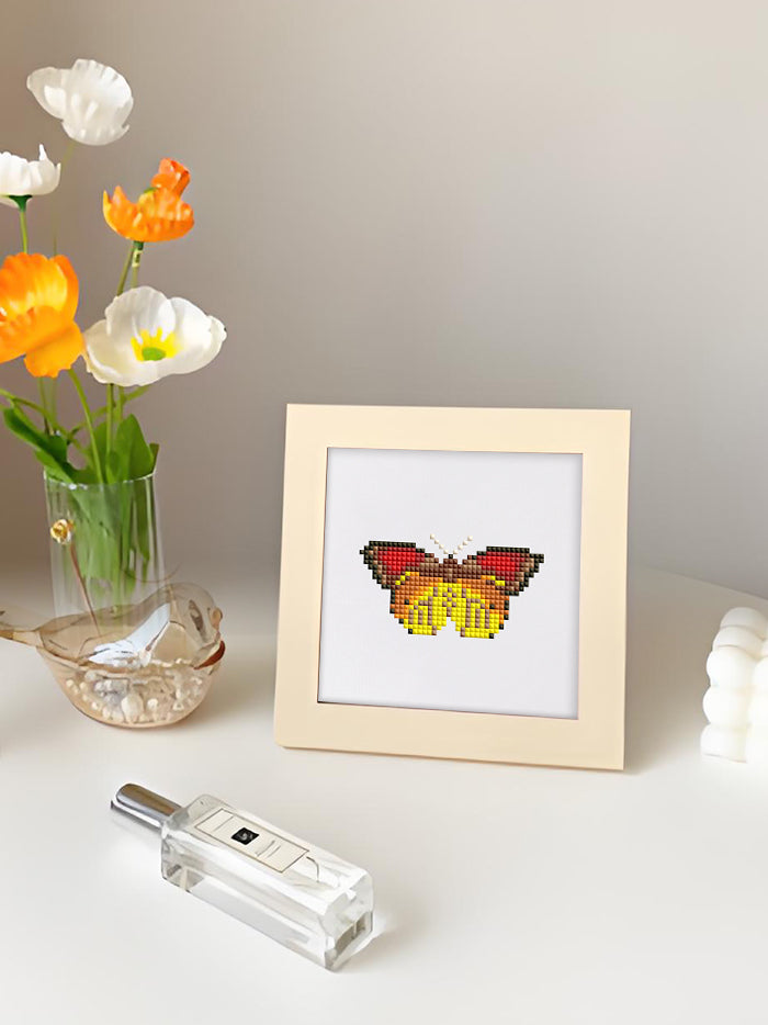 Bright yellow and red butterfly diamond painting, great for kids or family diamond art crafts.