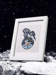 Space jellyfish design finished in diamond art and framed under stars – whimsical sci-fi decor.

