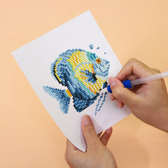 Close-up of sea fish diamond painting in progress. Soft canvas and detailed marine design from Ocean Whispers collection.easy DIY art set for sea lovers