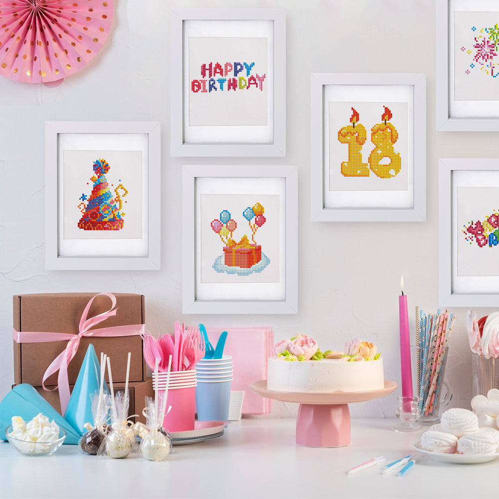 Framed birthday-themed diamond paintings with cake, candles, balloons, and text “Happy Birthday” displayed in a festive party setup—ideal for decorating birthday tables or kids’ craft areas, and perfect for beginners seeking fun and colorful mini kits.