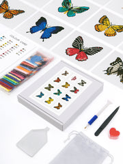  Top view of nine finished butterfly diamond art canvases from the Mini Butterfly Kingdom 2 kit, featuring vibrant pixelated butterfly designs.