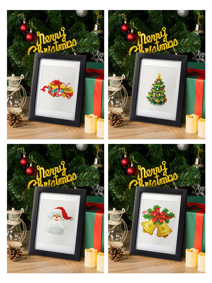 Framed collection of mini diamond paintings featuring Santa, bells, and wreaths. Great for showcasing holiday crafts at home or gifting.
