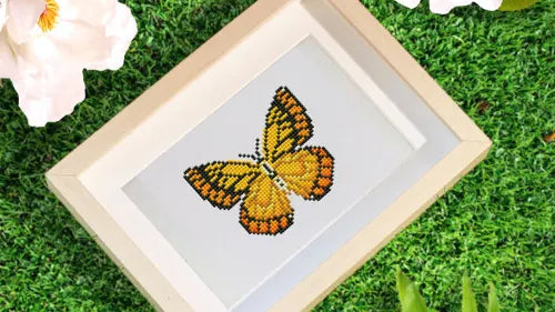 Miniature 10x15cm butterfly diamond painting kit with a frame is great for beginners. It is perfect for small home decor or gifts. This kit is part of a collection of small, themed diamond art.