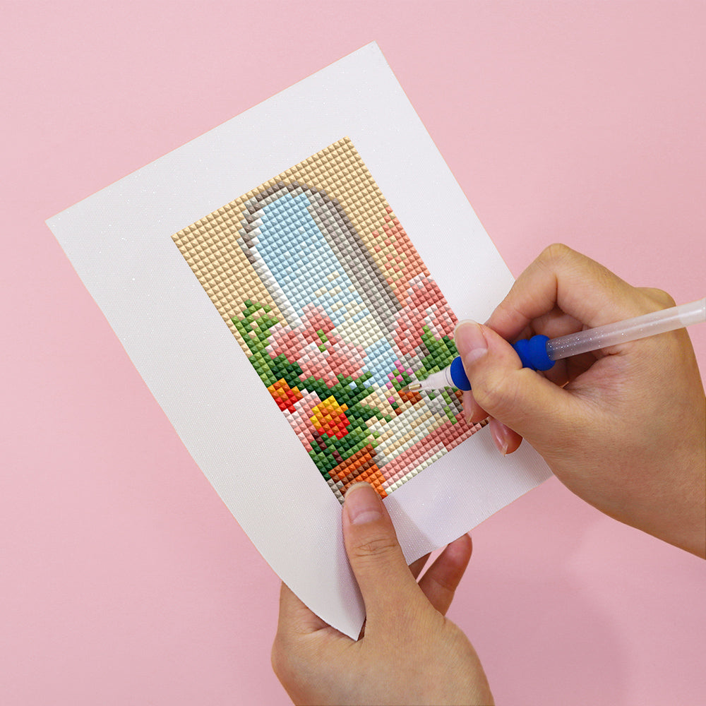 Close-up of a rose-decorated door diamond painting canvas in progress, ideal for floral wall decor and creative relaxation.