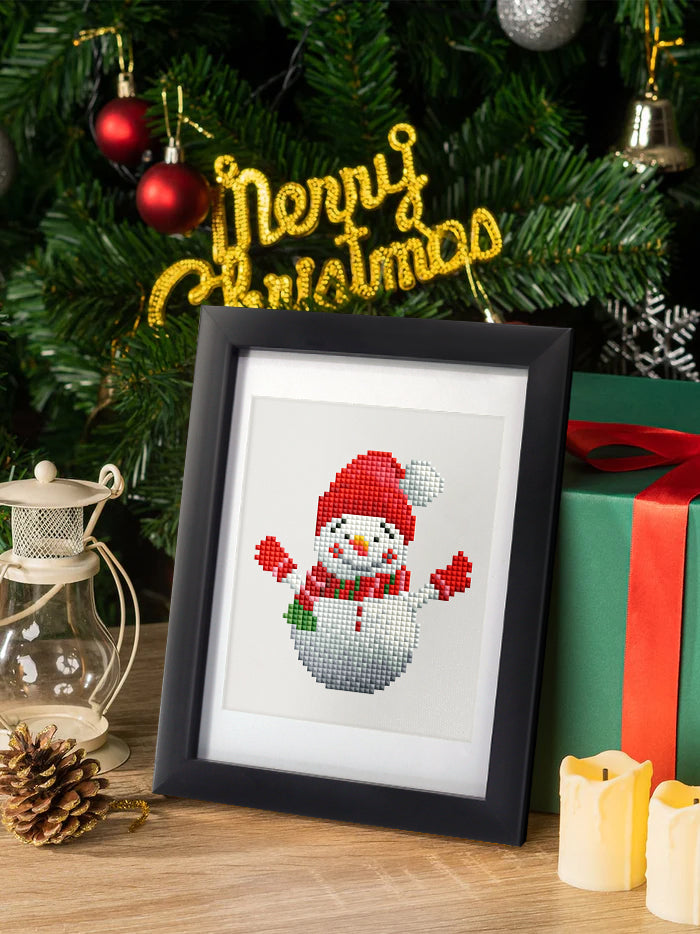 A framed Santa Claus diamond painting displayed on a Christmas-decorated wall. Perfect as a warm, handmade decoration or creative gift.