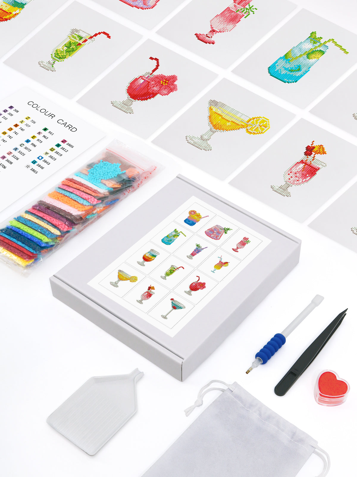 Complete tropical cocktail mini diamond painting kit with trays, pens, glue, and pattern cards.

